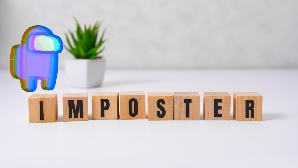 wooden blocks spell the word "imposter" on a table with a factored image of a character from Among Us stands in the background.